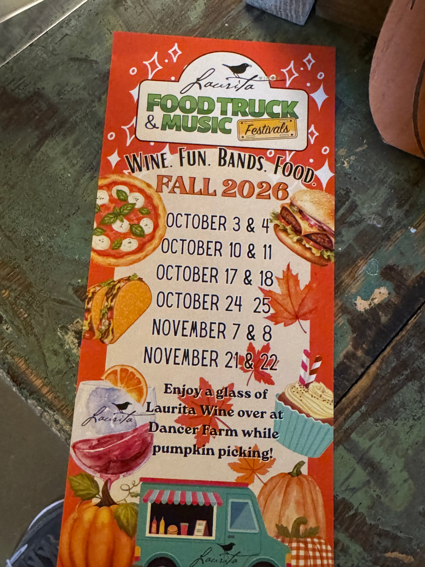 Laurita’s photographed Fall 2026 Food Truck and Music Festivals flyer listing October and November weekends