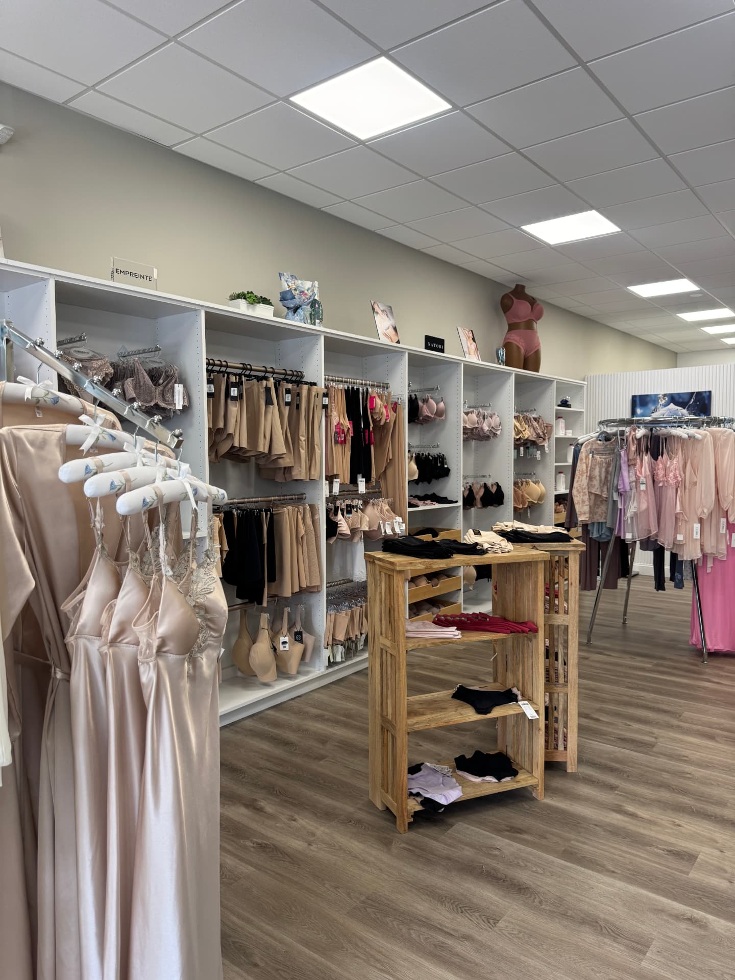 Inside Blue Rose Lingerie Boutique in Manalapan, with bras, lingerie and sleepwear arranged throughout the store