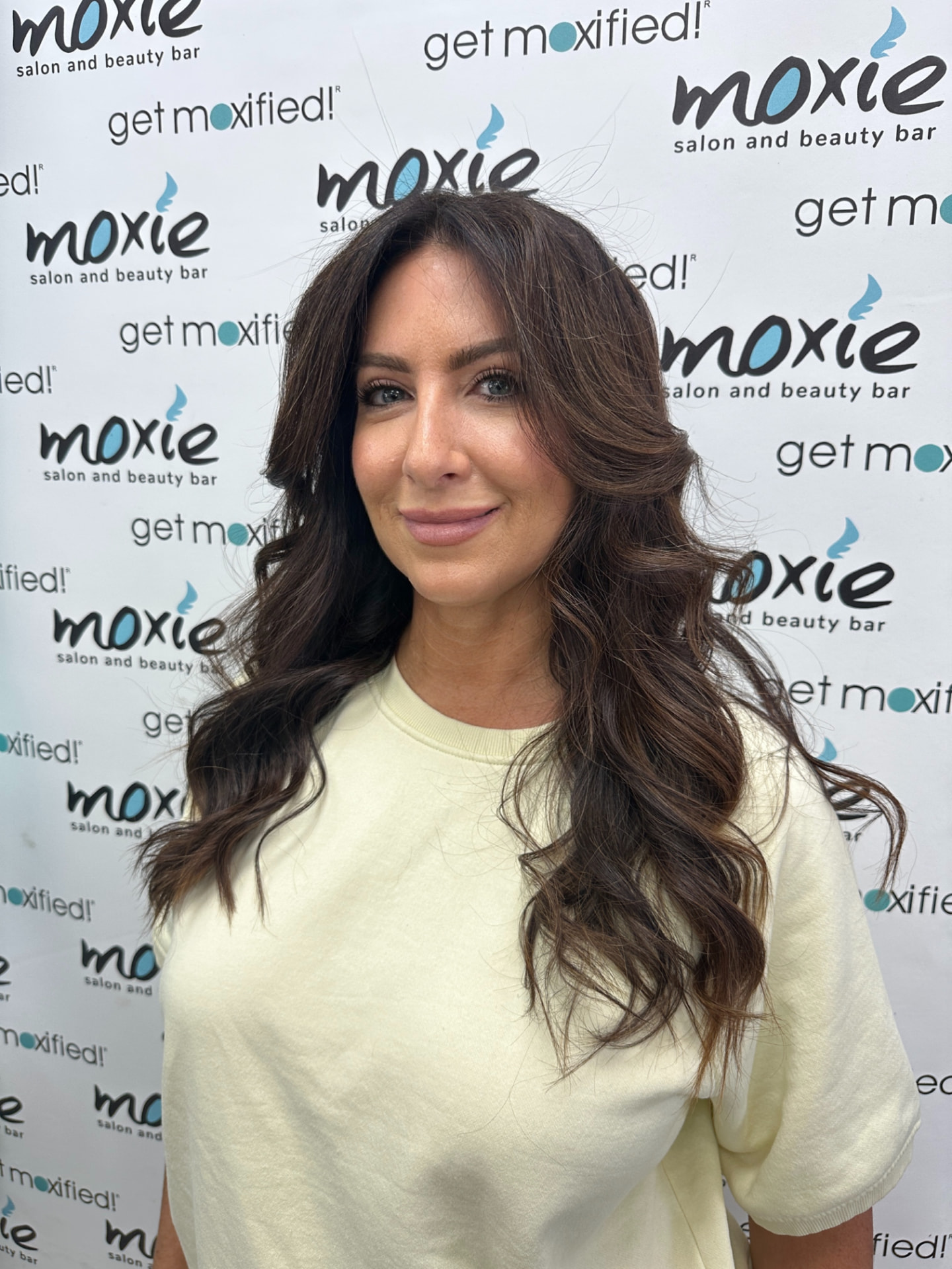 A finished Moxie Transformation reveal at Moxie Salon & Beauty Bar in Red Bank